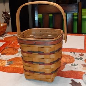 Preowned Longaberger 1995 Carry Along basket.